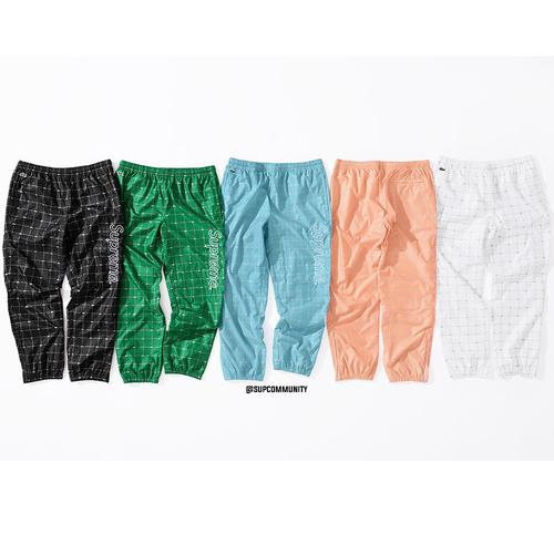 Details on Supreme LACOSTE Reflective Grid Nylon Track Pant from spring summer
                                            2018 (Price is $138)