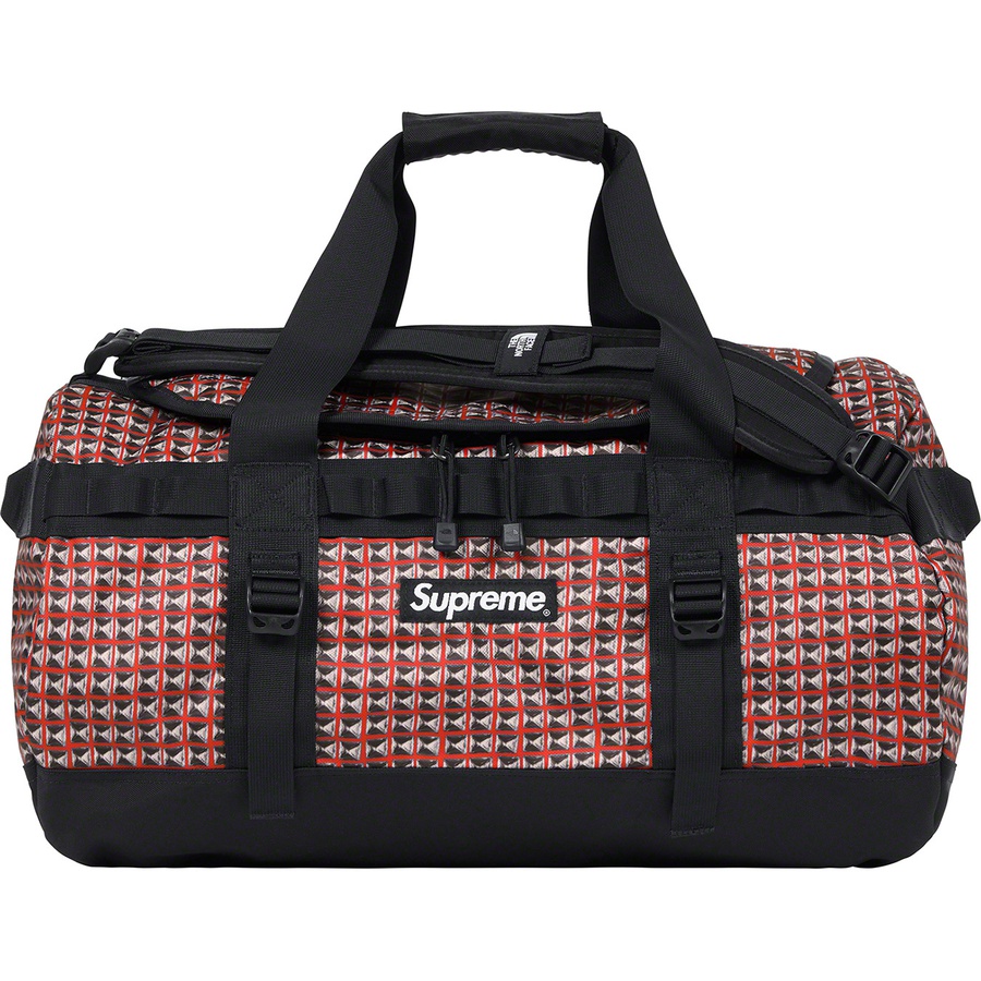 Details on Supreme The North Face Studded Small Base Camp Duffle Bag Red from spring summer
                                                    2021 (Price is $168)