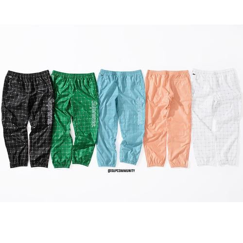 Details on Supreme LACOSTE Reflective Grid Nylon Track Pant from spring summer 2018 (Price is $138)