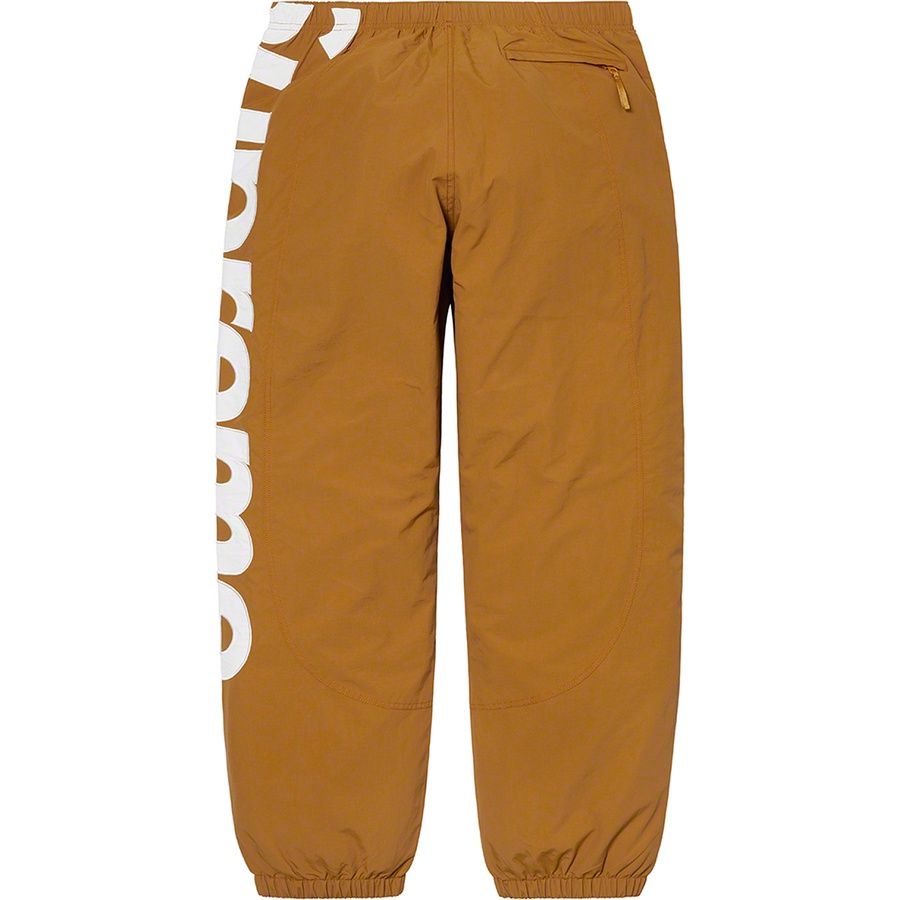 Details on Spellout Track Pant Dark Gold from spring summer
                                                    2021 (Price is $138)