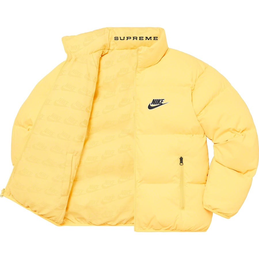 Details on Supreme Nike Reversible Puffy Jacket Pale Yellow from spring summer
                                                    2021 (Price is $258)