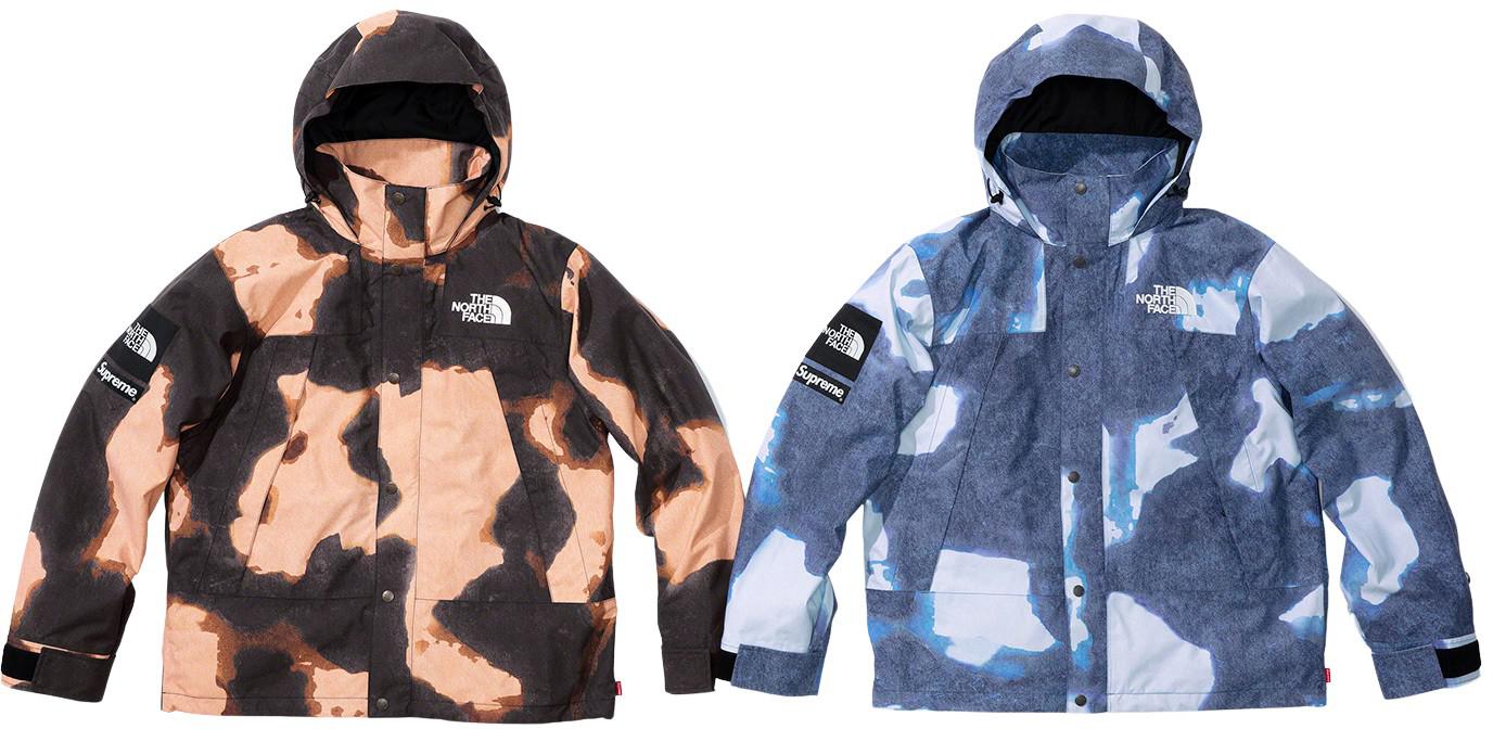 Supreme®/The North Face® Bleached Denim Print Mountain Jacket with stiker