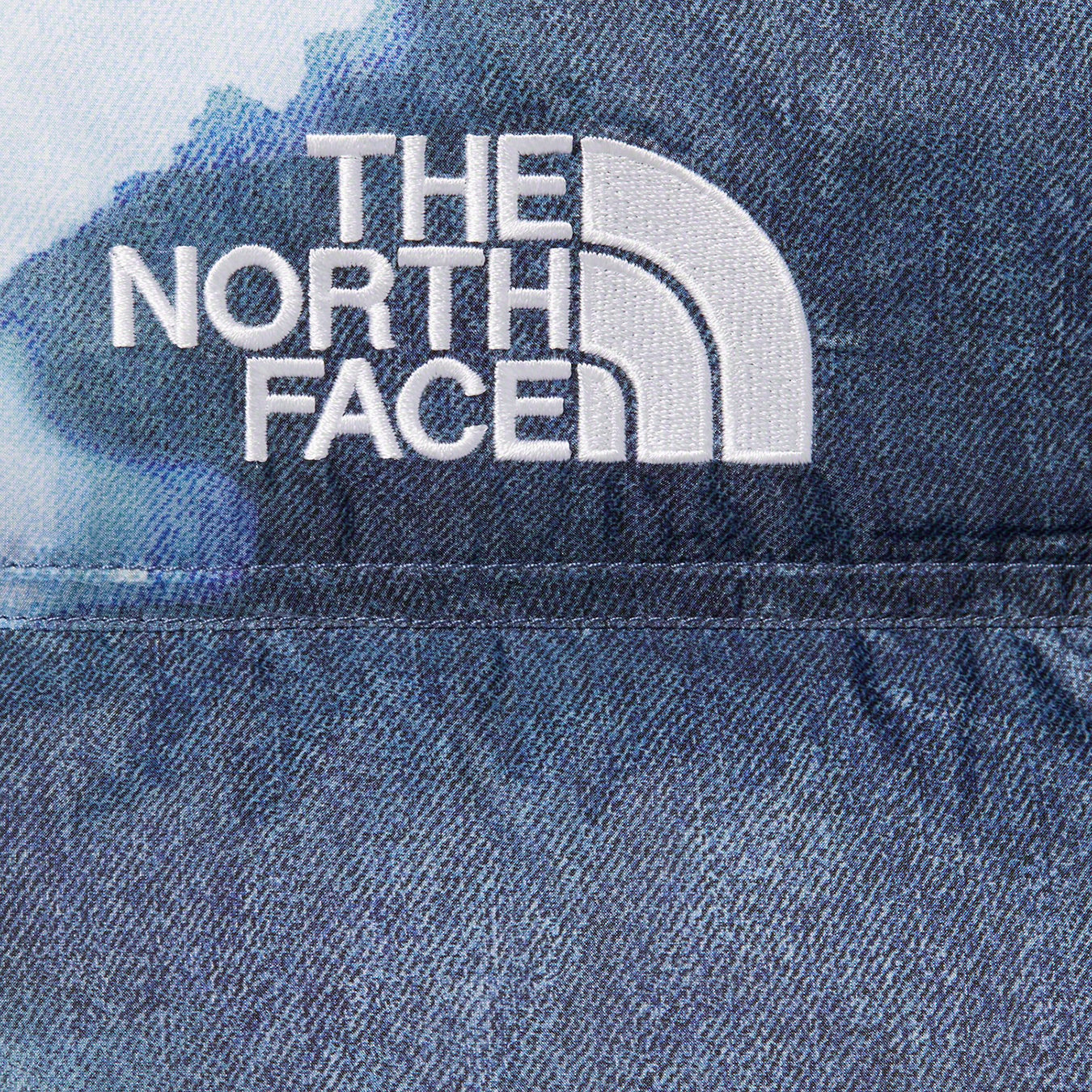 Supreme The North Face Bleached Denim Print Nuptse Jacket Indigo