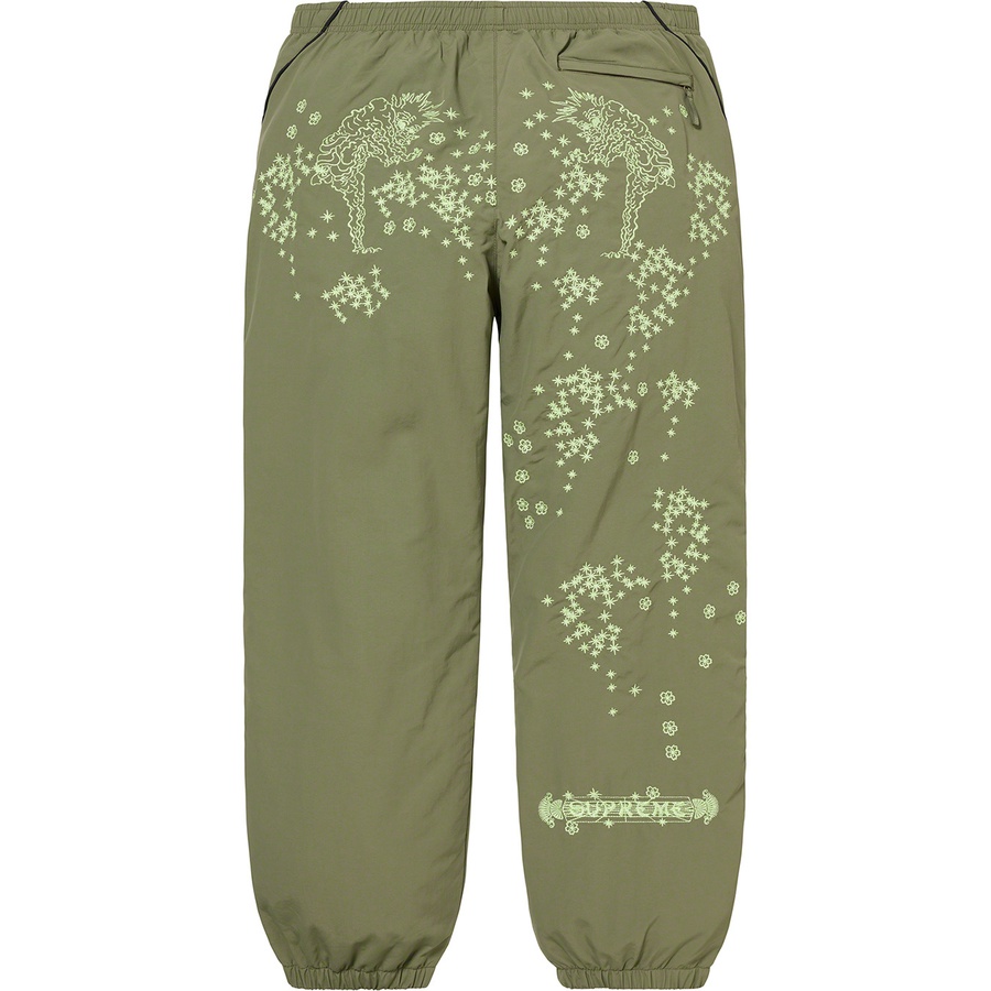 Details on AOI Glow-in-the-Dark Track Pant Olive from spring summer
                                                    2022 (Price is $148)