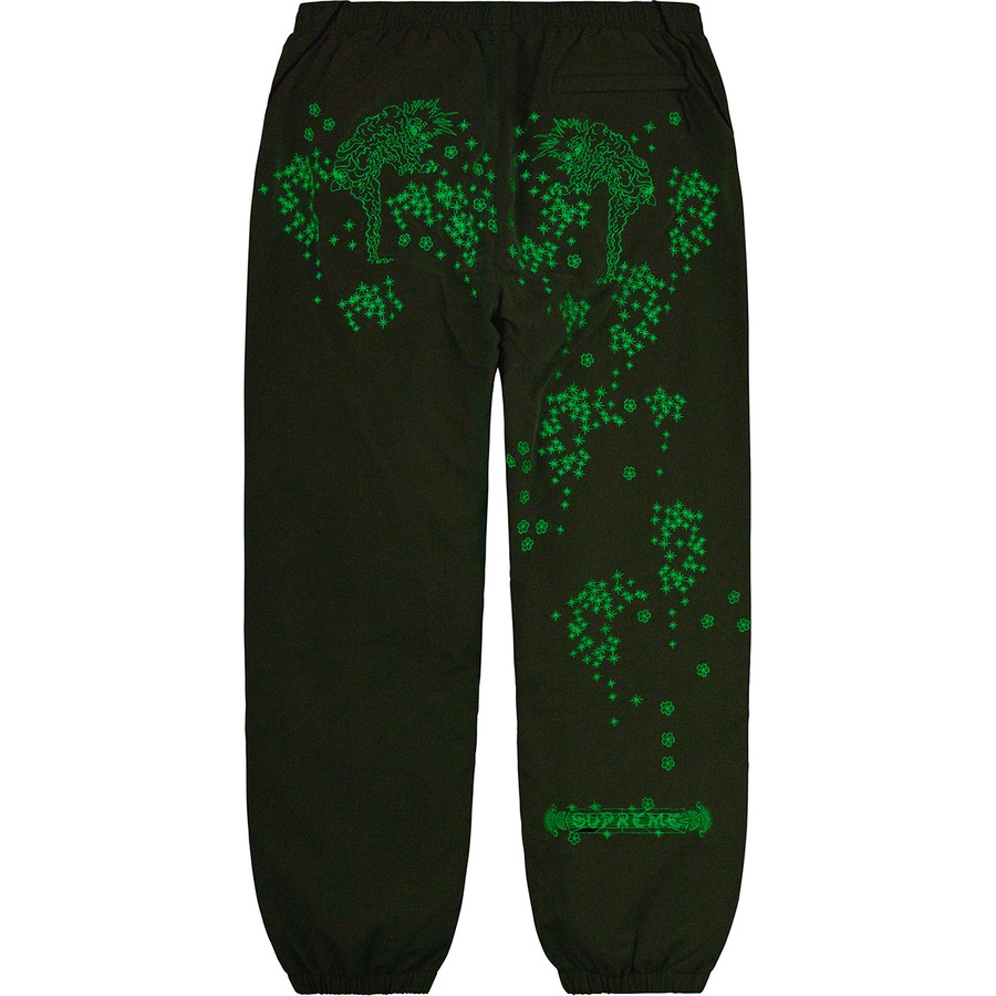 Details on AOI Glow-in-the-Dark Track Pant Olive from spring summer 2022 (Price is $148)