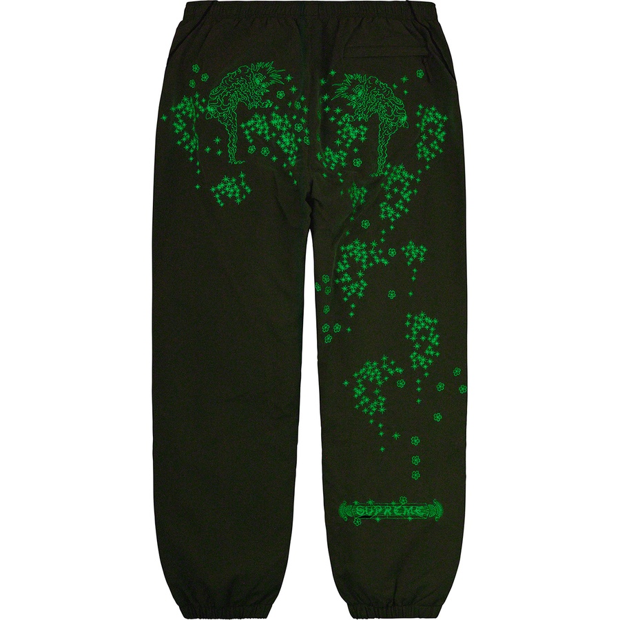 Details on AOI Glow-in-the-Dark Track Pant Olive from spring summer
                                                    2022 (Price is $148)