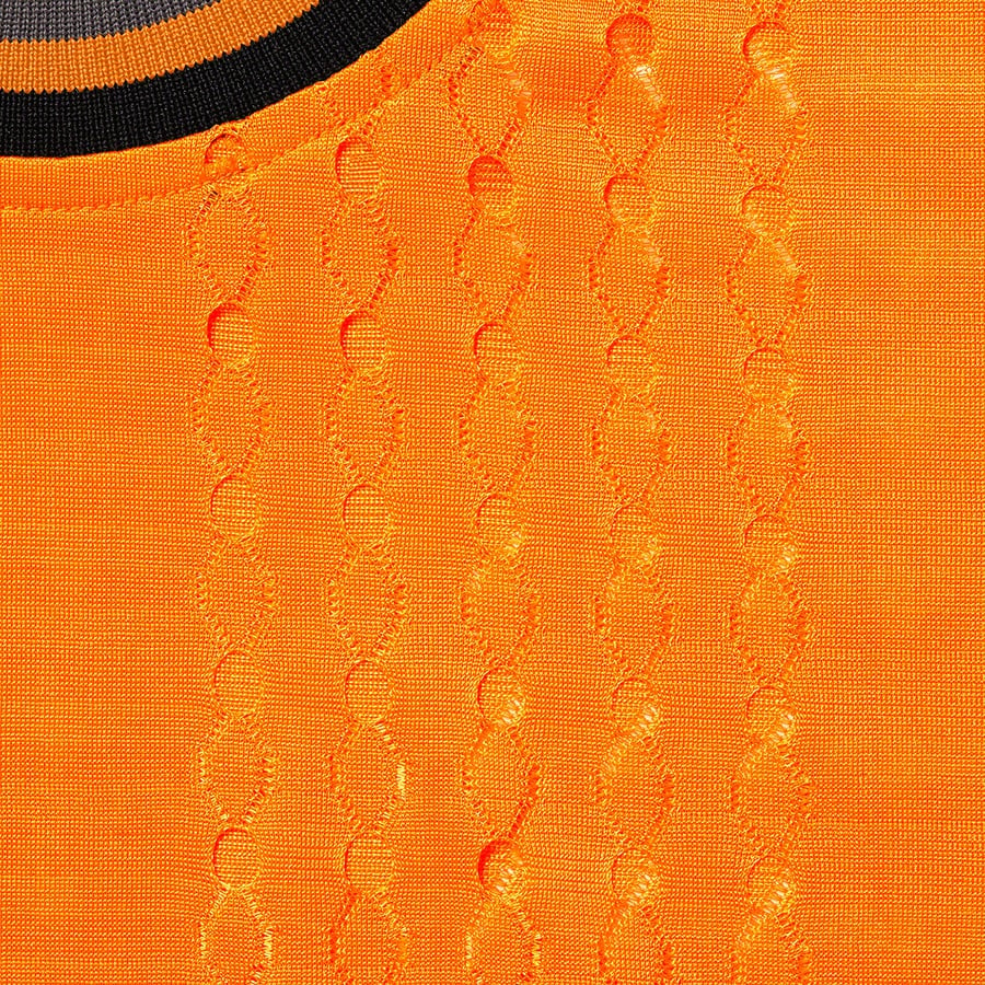 Details on Perforated Stripe Warm Up Top Orange from spring summer 2022 (Price is $78)