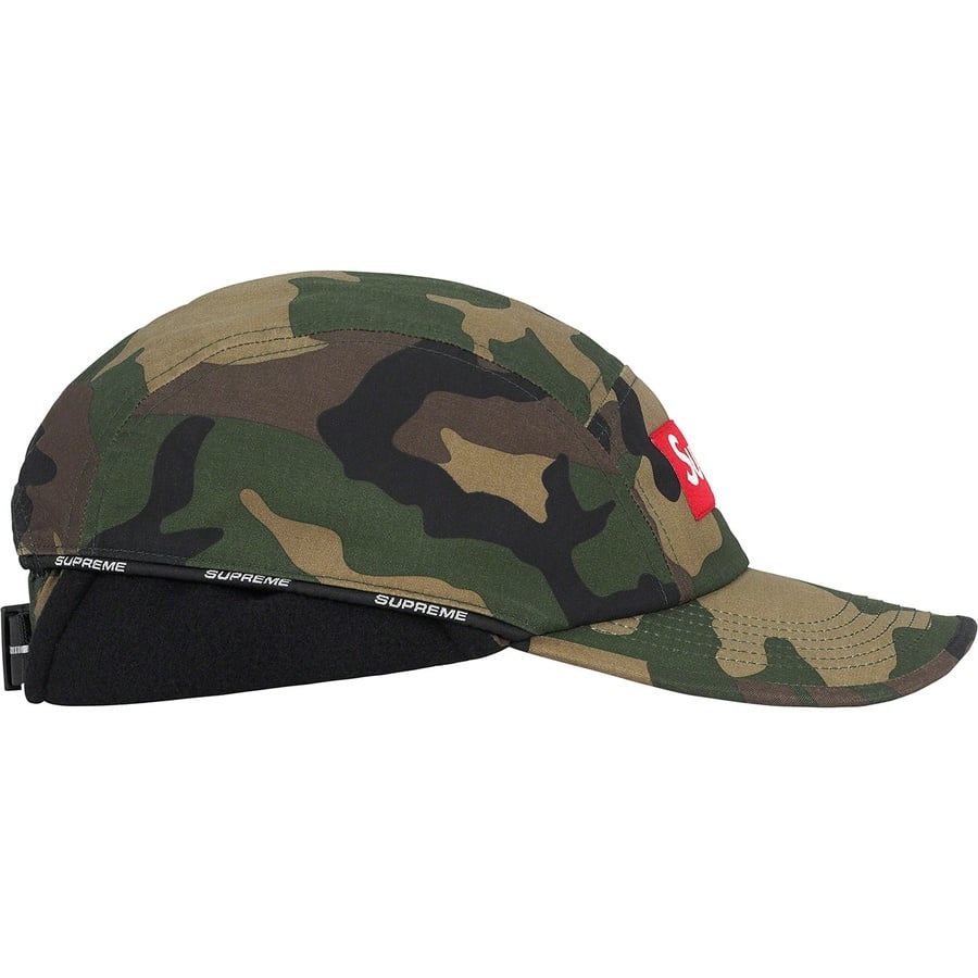 Details on Packable Earflap Camp Cap Woodland Camo from fall winter 2022 (Price is $60)