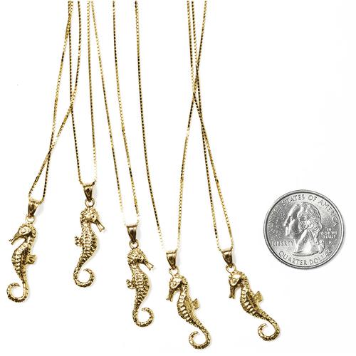 Details on Seahorse Gold Pendant from fall winter
                                            2016