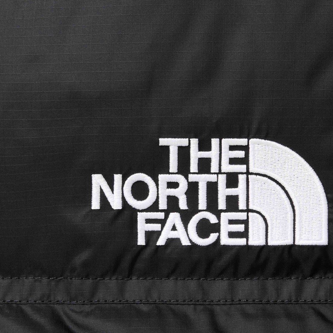 Details on Supreme The North Face Split Nuptse Jacket Black from spring summer
                                                    2024 (Price is $398)